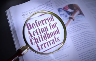 DACA Recipients Can’t Exploit an Immigration Law to Gain Pathway to Citizenship Deferred Action for Childhood Arrivals words under a magnifying glass