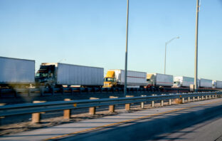 Texas Works Around Biden to Get Border Security Agreements With Three Mexican States long line of trucks mexico